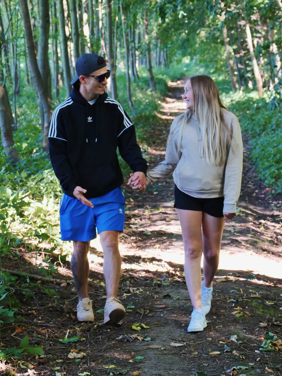 Couple walking in the forest