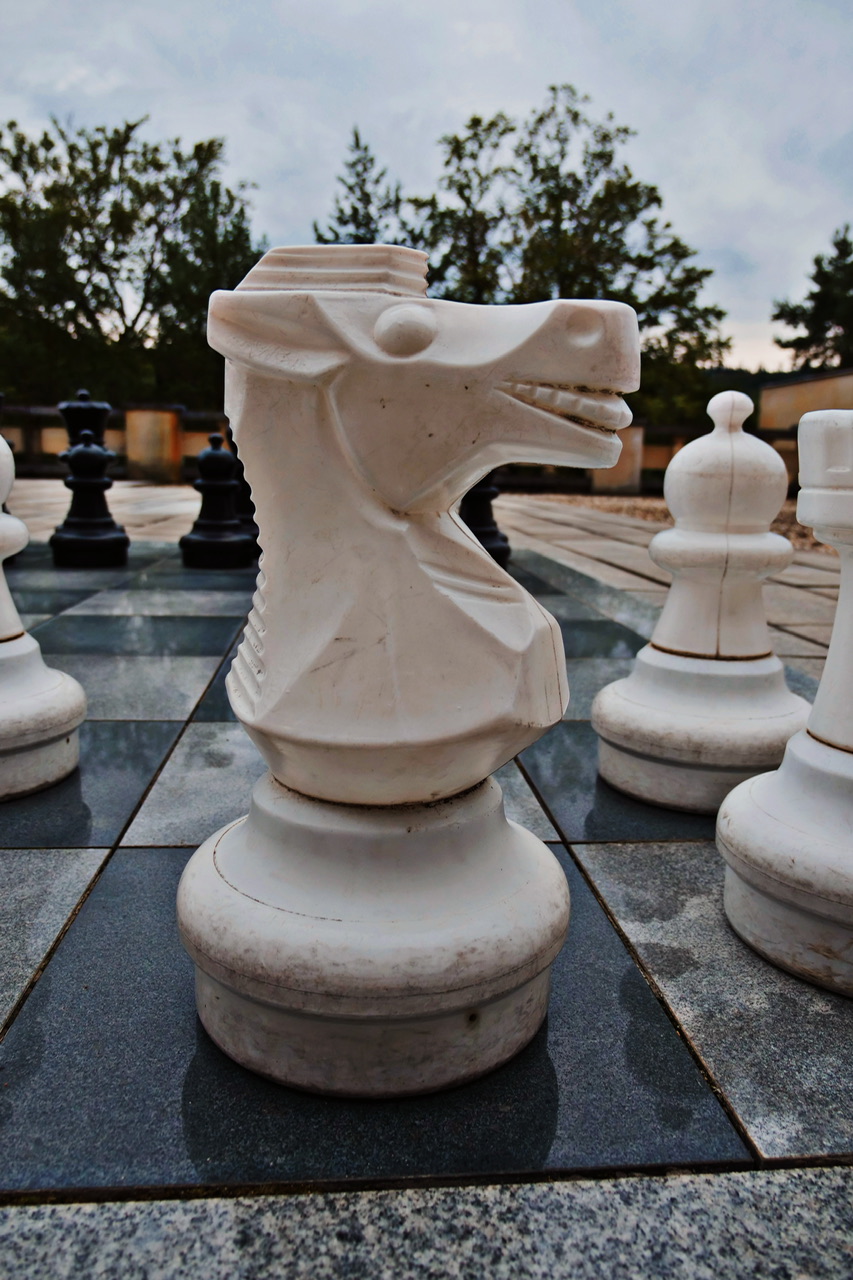 Giant white knight chess piece outdoors